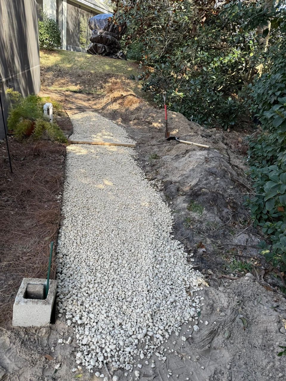 Material being laid out after delivery by JNJ Hauling Solutions of Citrus County