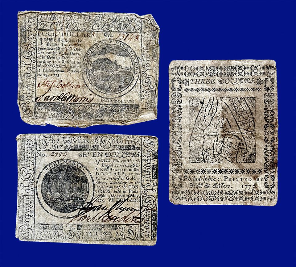 Three pieces of continental currency printed in 1775 (from the groton history center collections)