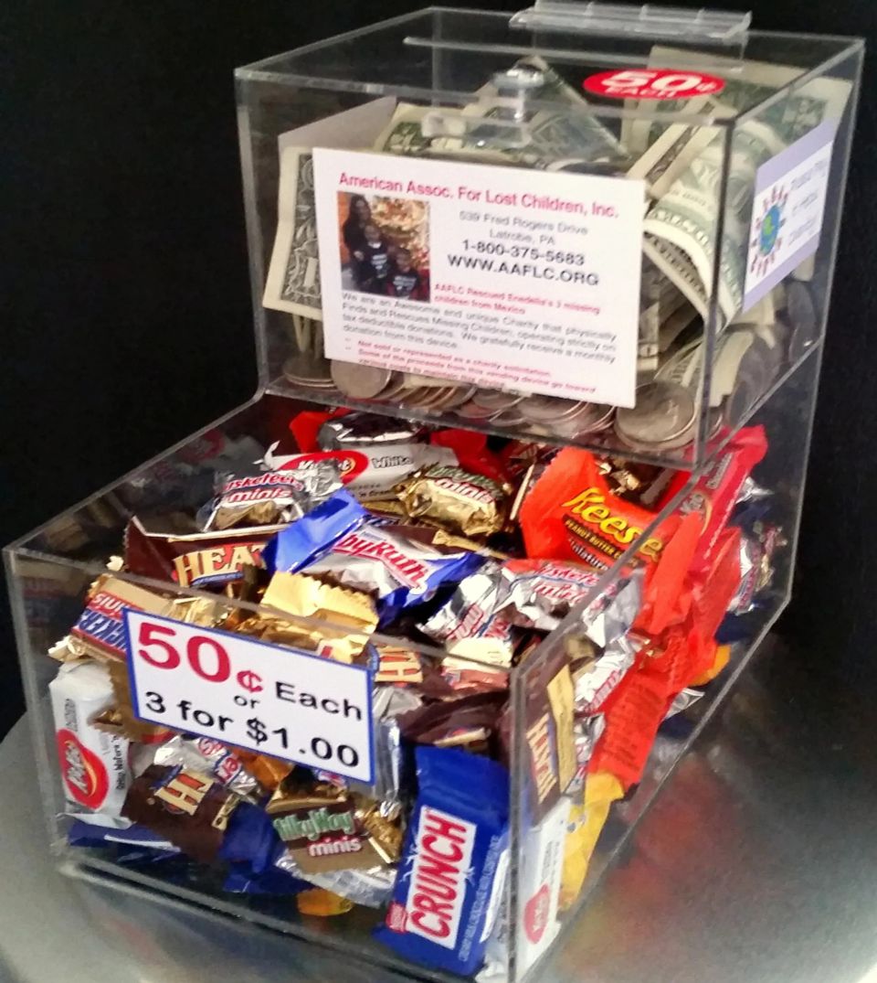 Acrylic Honor Boxes on the countertop of a restaurant