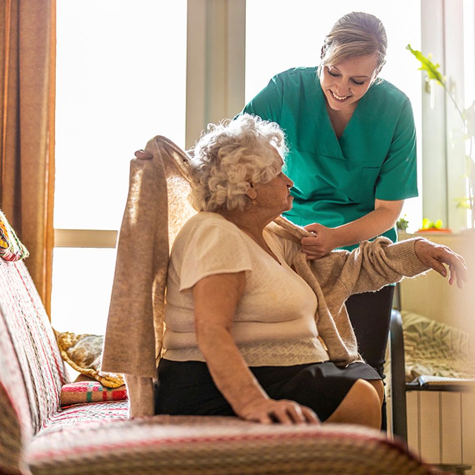 Bigstock female nurse taking care of a 412940281 home health care