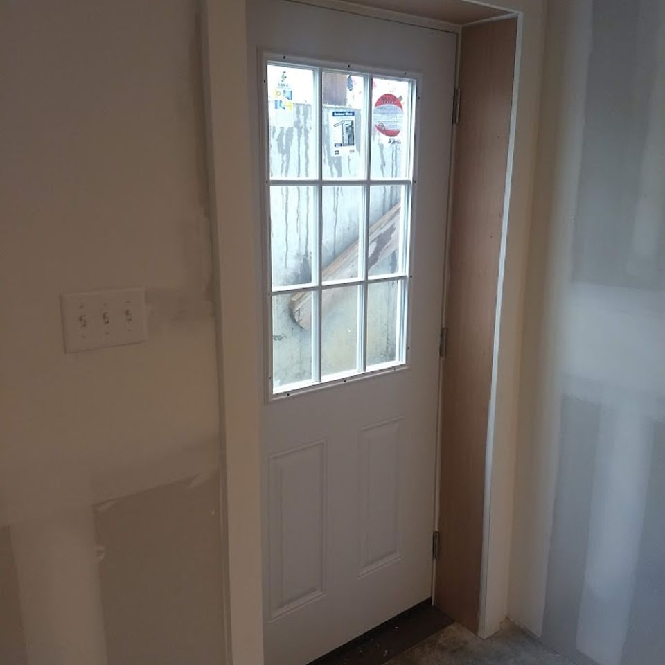 Door installment taken from the inside, done by Taurus Contracting Inc., of Suffolk County NY