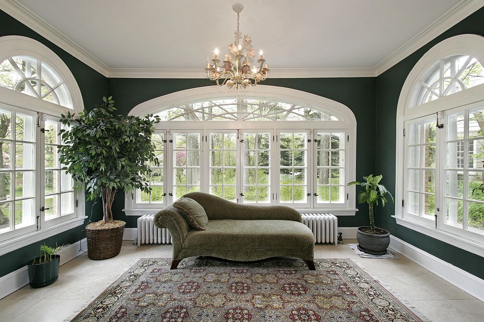 Gorgeous sunroom with windows on every side 