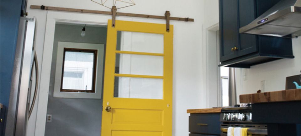 Nuredo magazine   tulsa oklahoma   remodeling   home upgrades that make cents   13953 intro   rolling yellow barn door in kitchen20180126 2580 119t7et