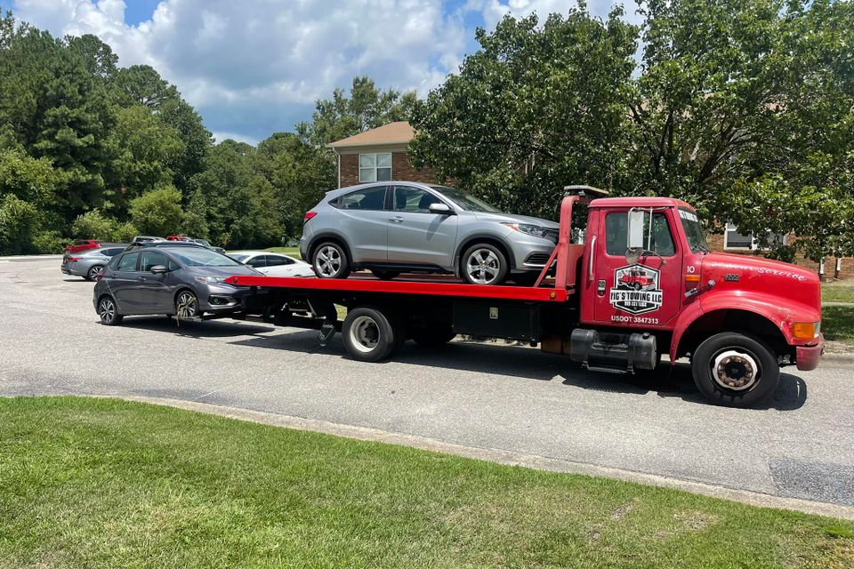 Figs towing red rollback 2 cars