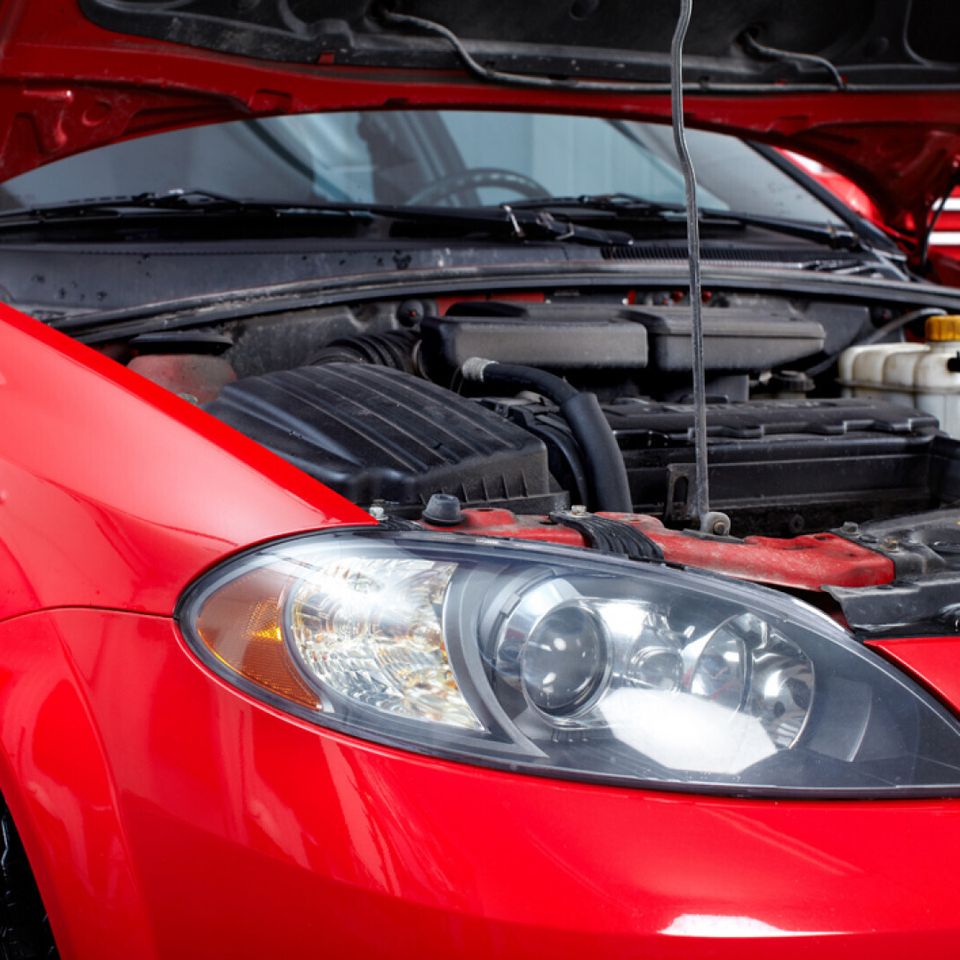 Car with open hood in auto rep 17662550 (2)