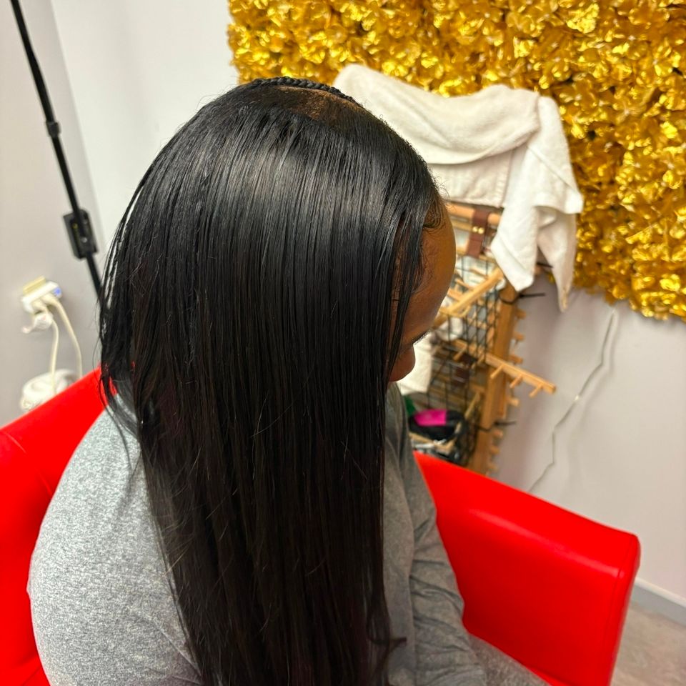 Weaves, done by Amazing African Hair Braiding by Ruthy, in LA