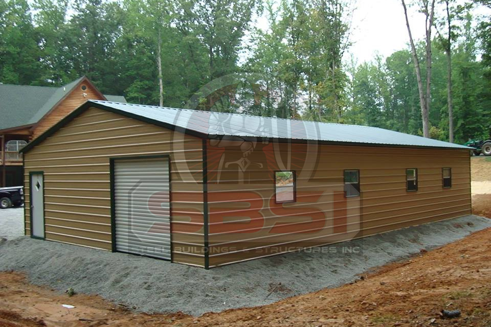 Tan steel garage with black trim roll up door and windows with SBSI watermark representing steel garages in Alabama