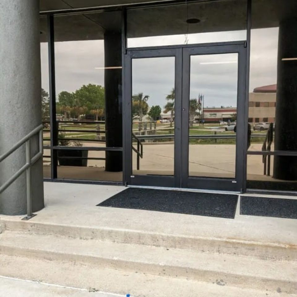 Commercial storefront window tint installation in Sugar Land