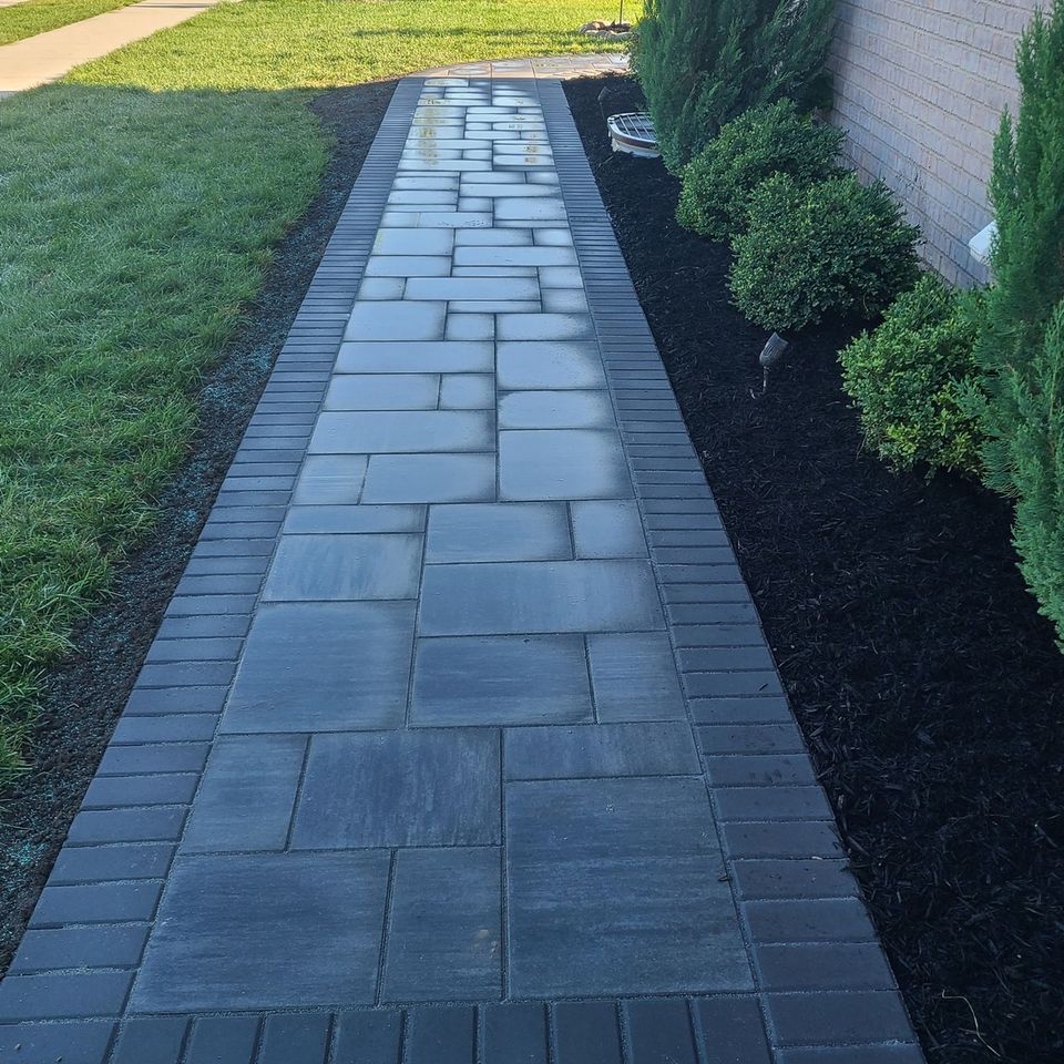 Beautiful patio walk way done by Vic's Landscaping