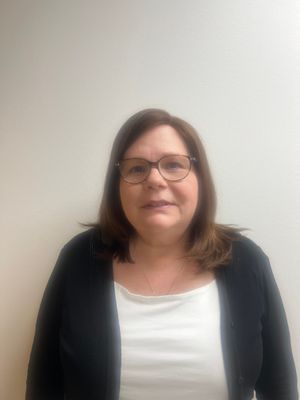 Gina poslusny employee id photo