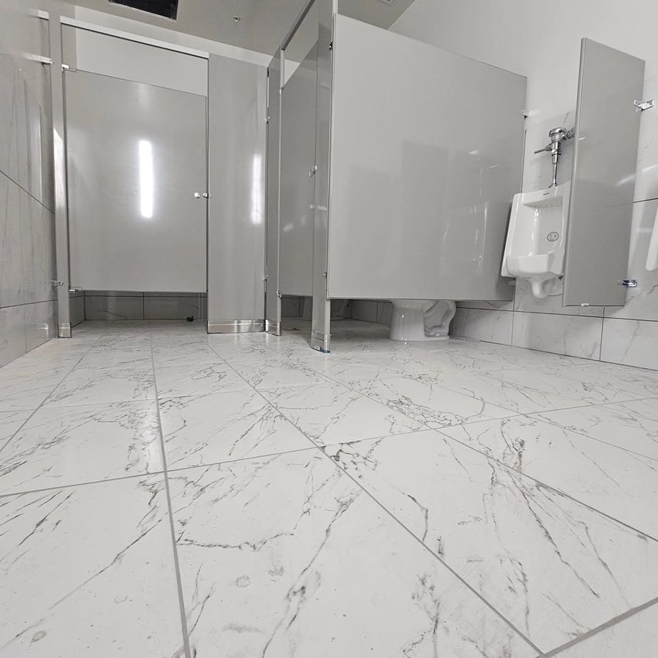 Silver bathroom partitions done by Pabst Leyton in Southern California