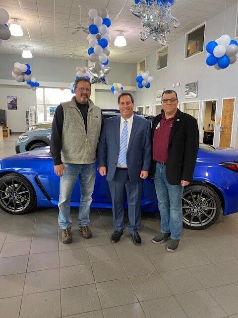 Mayor robert greenbaum  michael  antonelli general manager of subaru world of hackettstown  council president joe nicastro