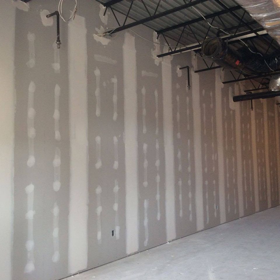 Garage drywall installation in progress