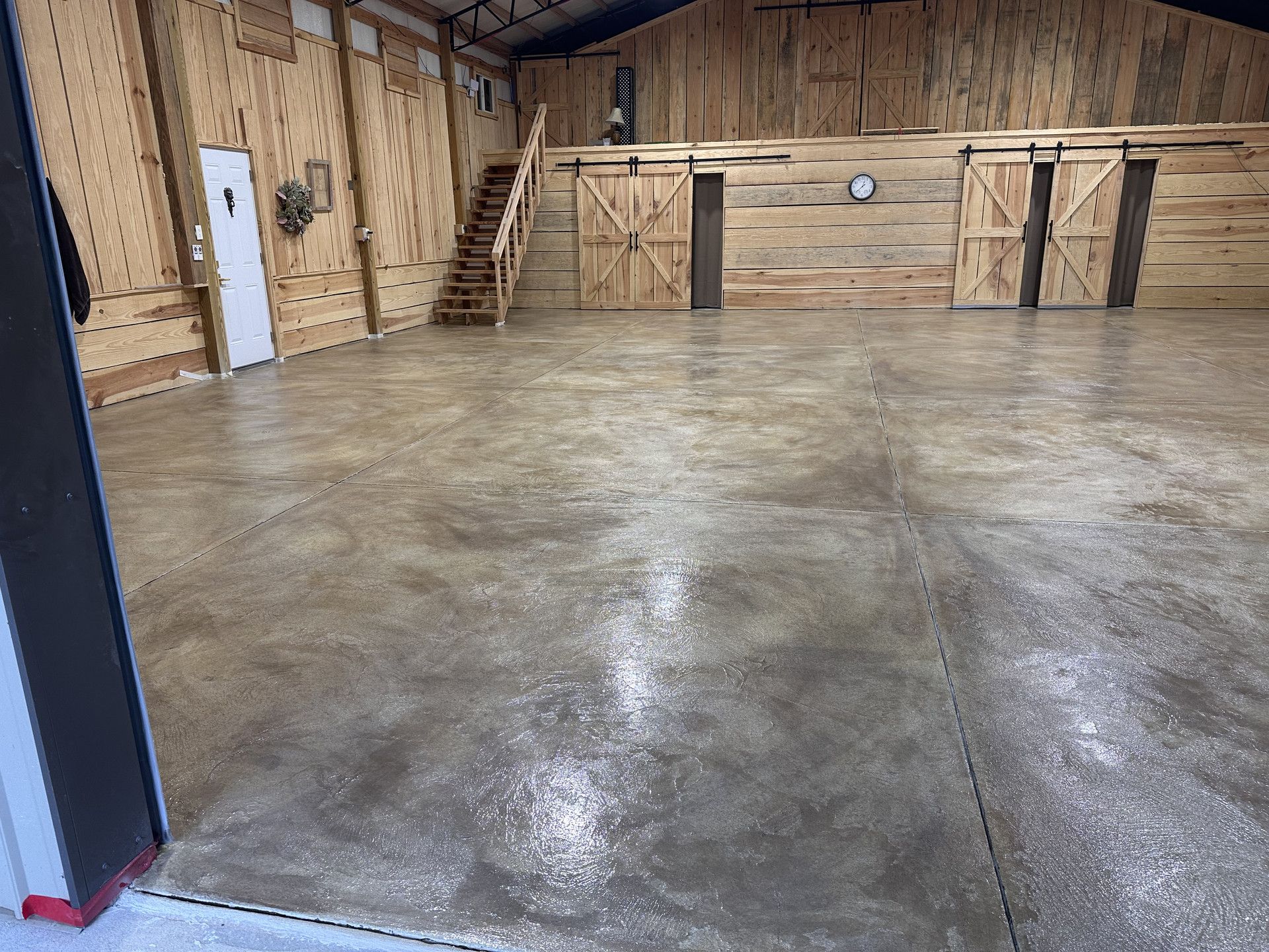 After: finished decorative concrete garage floor in multitone gray