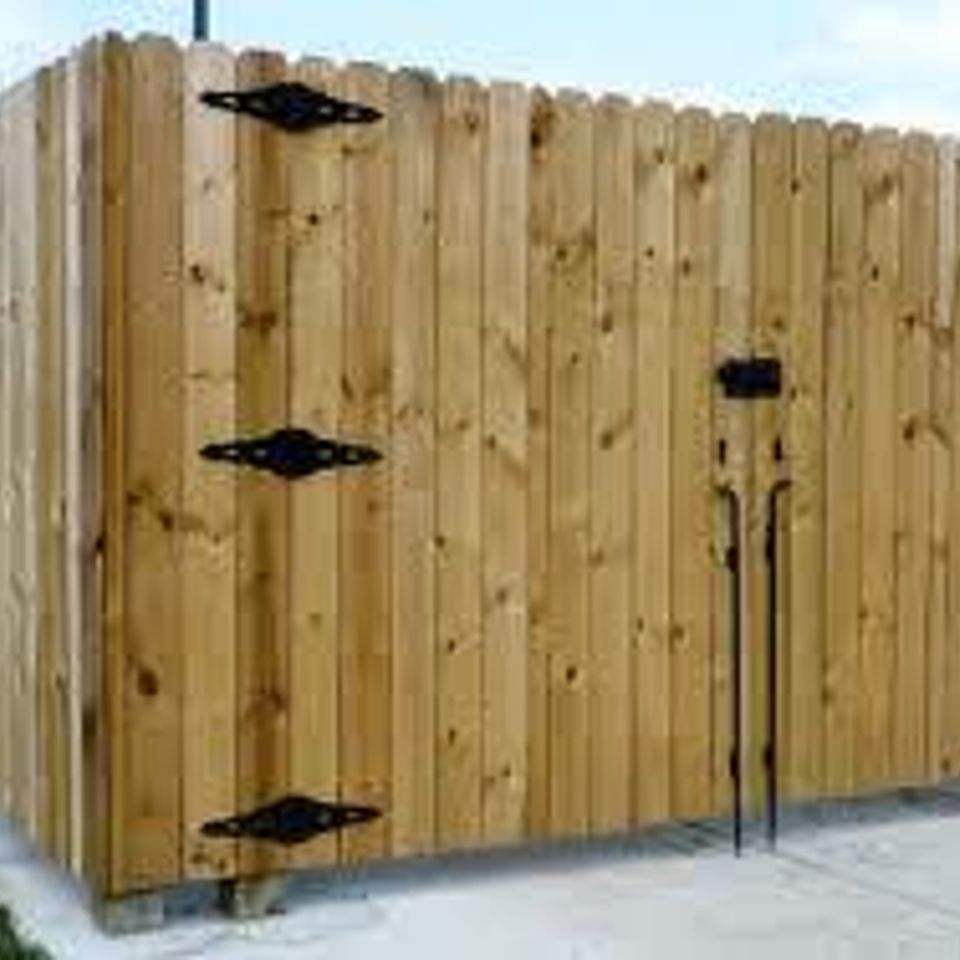 Weatherproofed stained privacy fence and gate