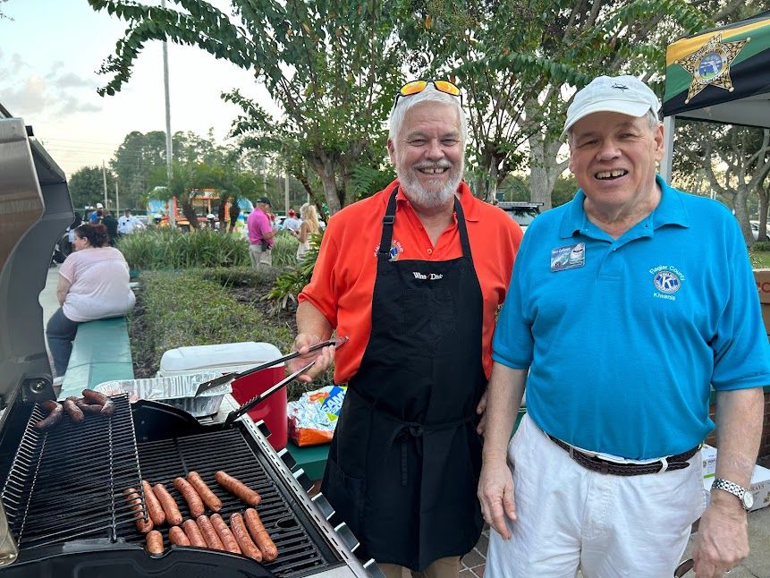 Kiwanis clubs cook hotdags for national night out