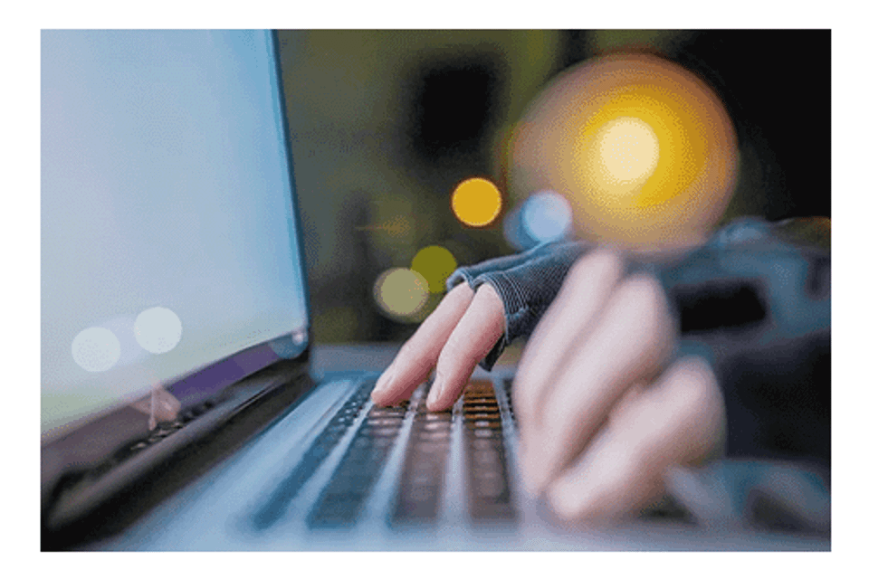 Hacker at keyboard