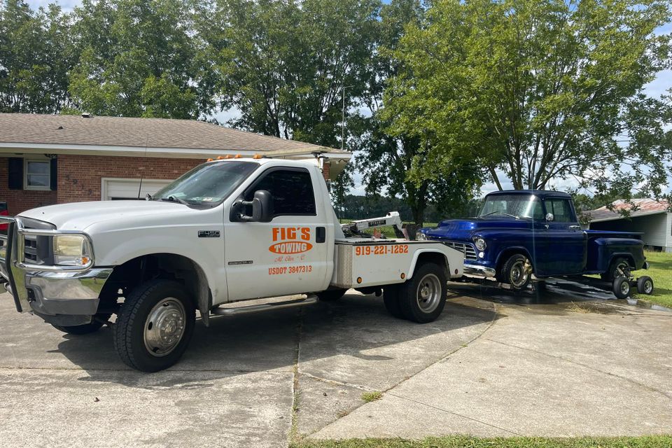 Figs towing white truck