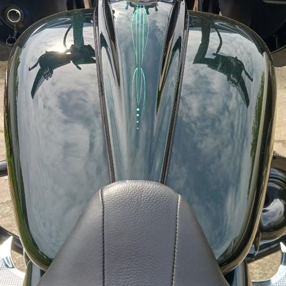 Creative custom pinstriping design and artistic projects created by Skeeter's Grafix.