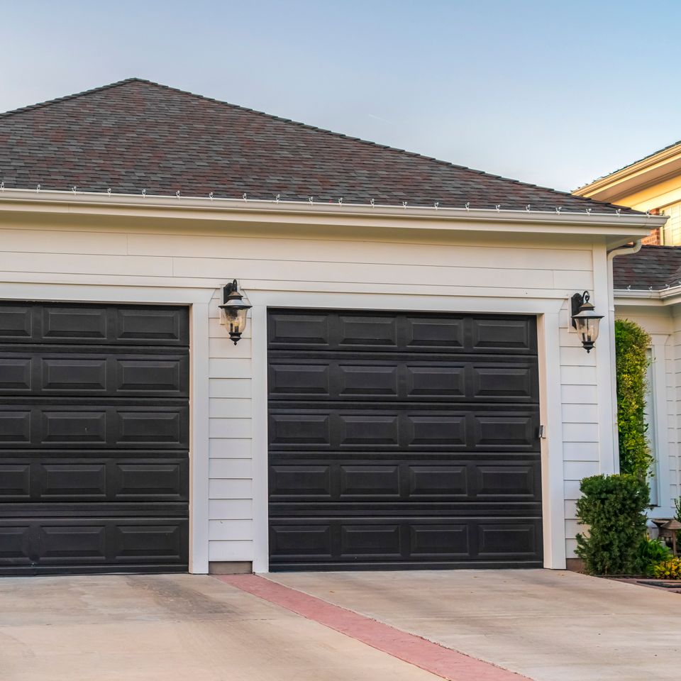 Square Double garage unit attached to a suburban house