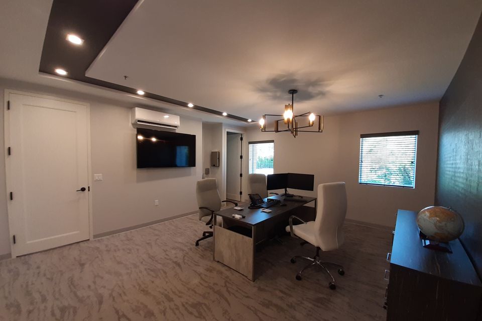 Executive office with modern furniture and high-end lighting in Orange County