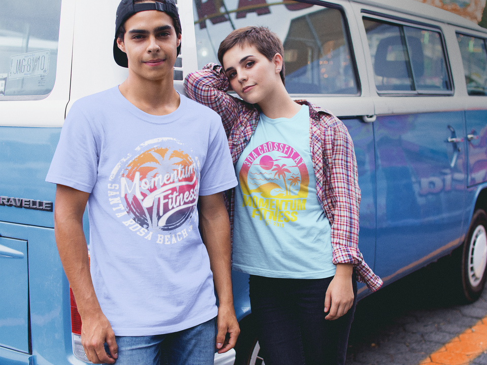 Couple wearing different round neck tees mockup against a blue van a16443
