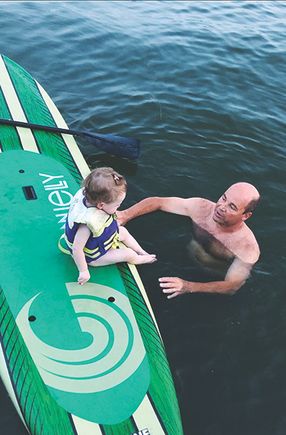 Mila with grandpa bob brockmann on wawasee