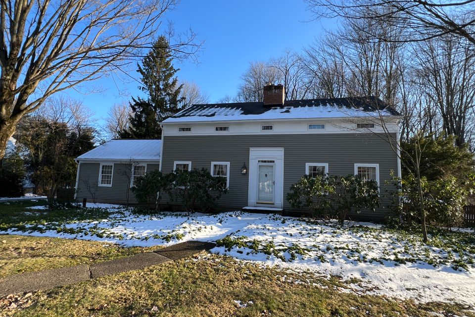 Front exterior of Chagrin Falls home before renovation project