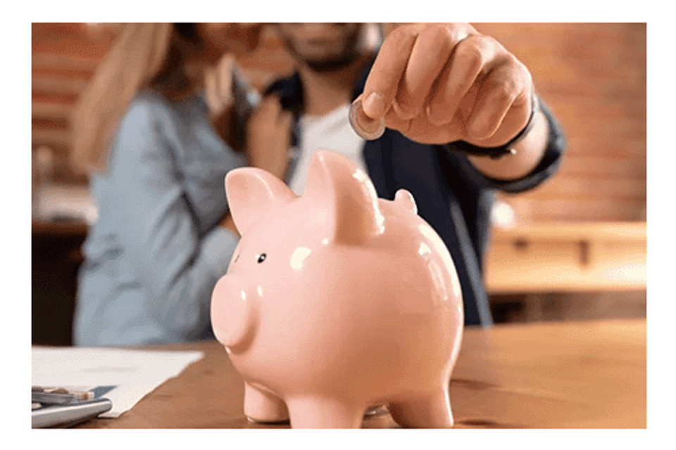 Putting coin in piggy bank 5