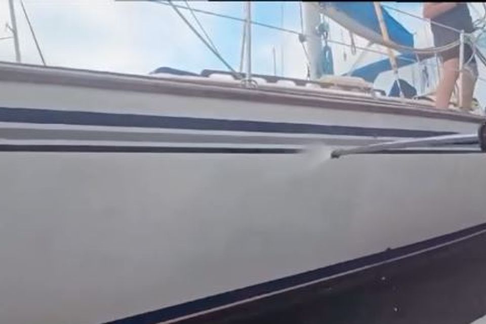 A dirty boat in need of detailing and pressure washing
