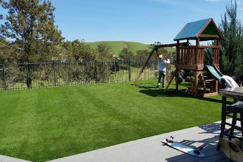 Beautiful Artificial grass backyard 