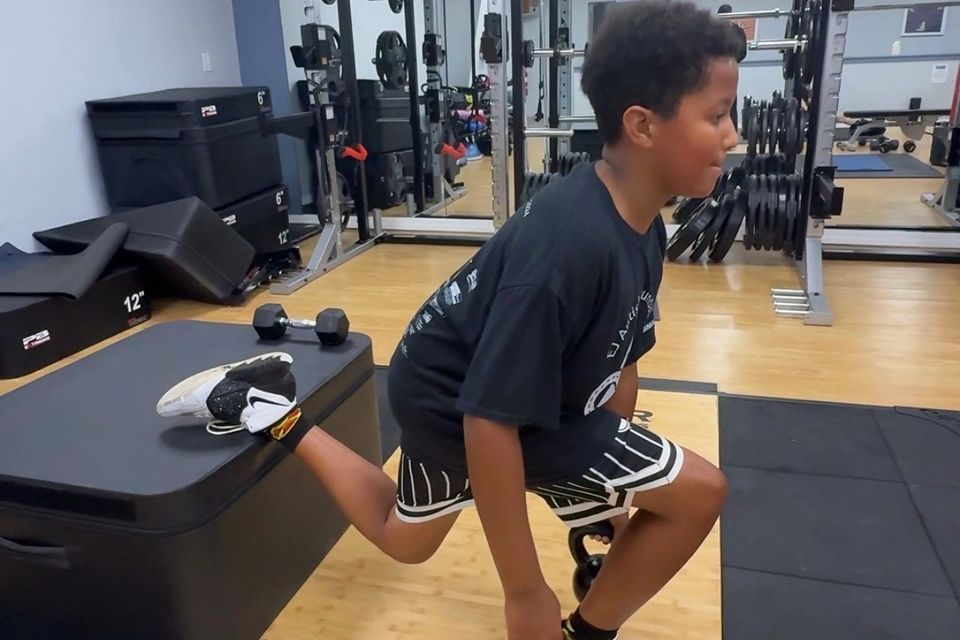 A student of XF Training doing strength training