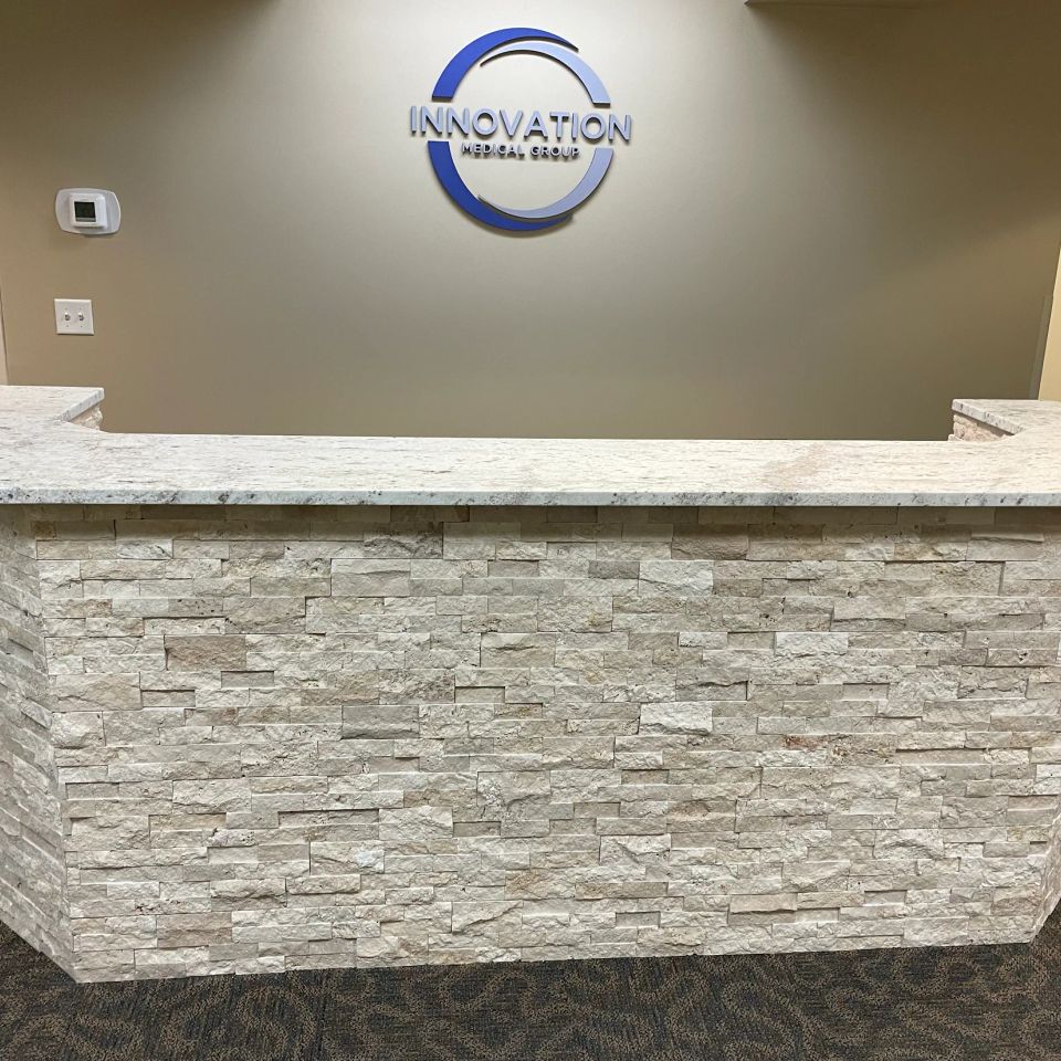 Stone reception desk from front