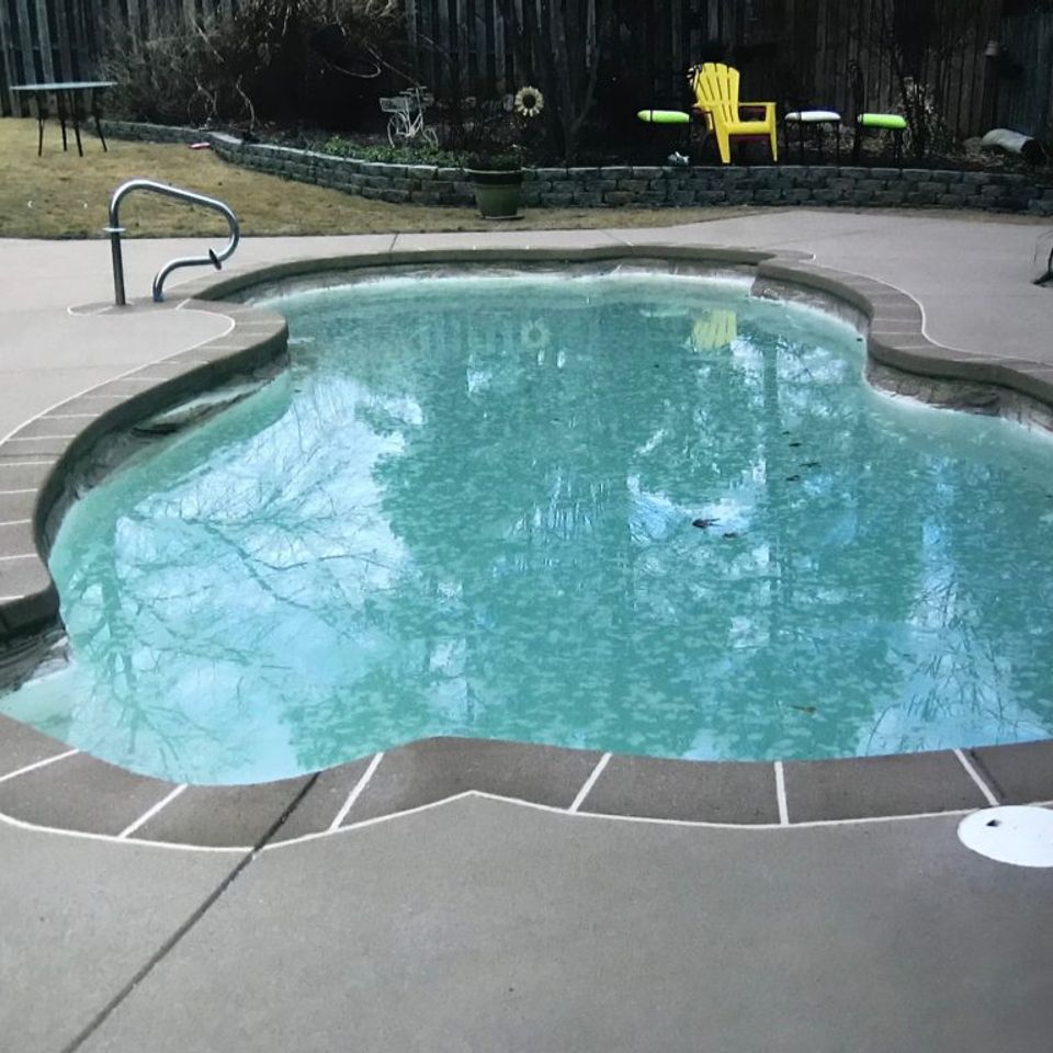 Concrete pool deck overlay after