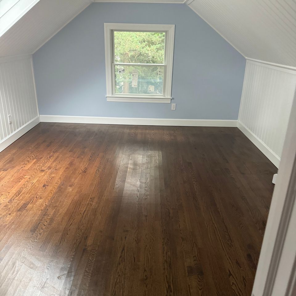 A wooden floor installation, done by Taurus Contracting Inc. of Suffolk County , NY