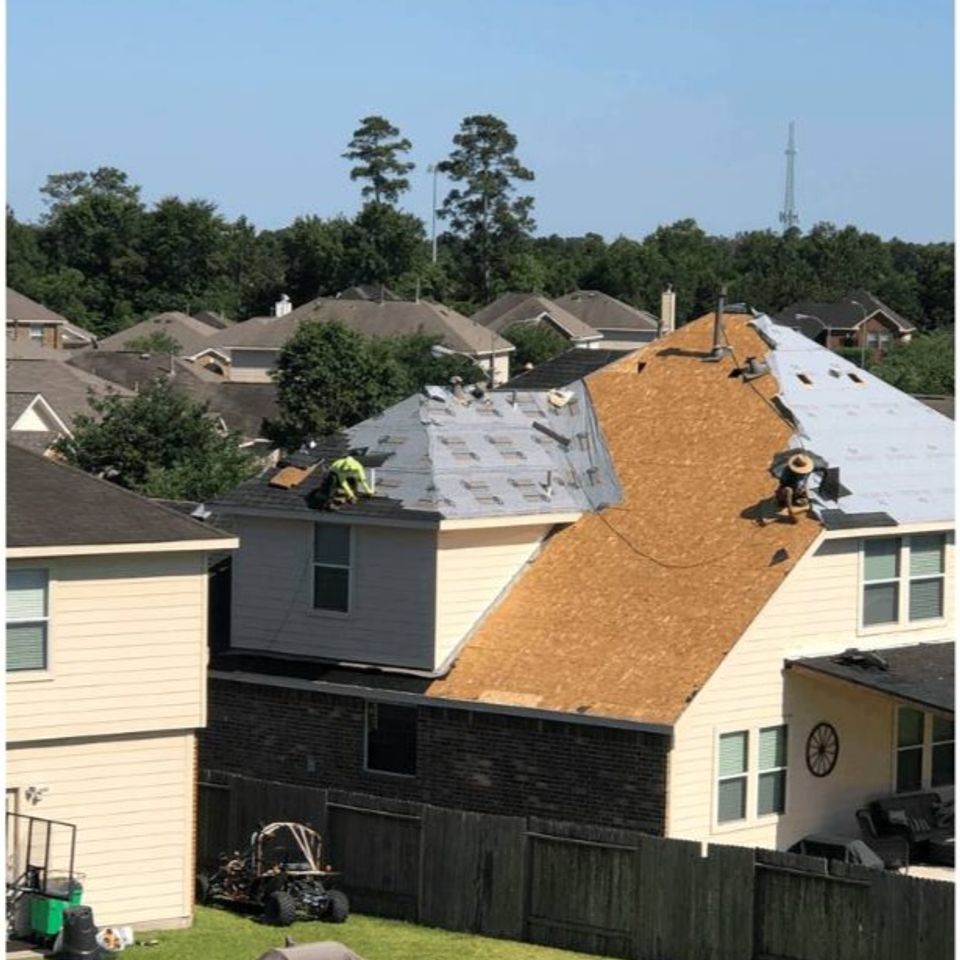 Architectural shingle roof installation on residential home in Spring Texas neighborhood