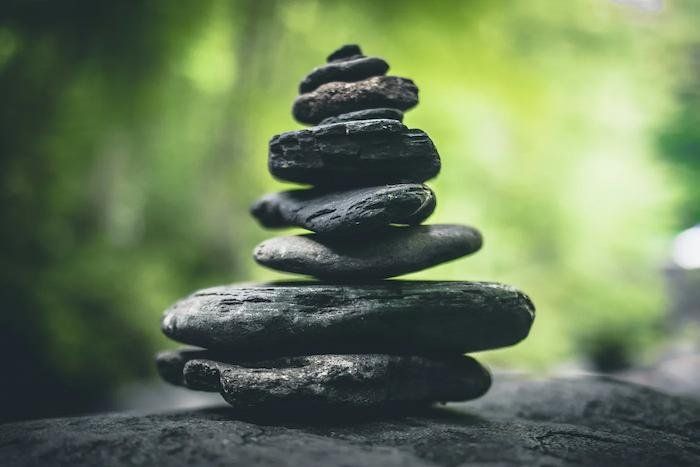 Stacked stones symbolizing a cairn or a way to find your direction 