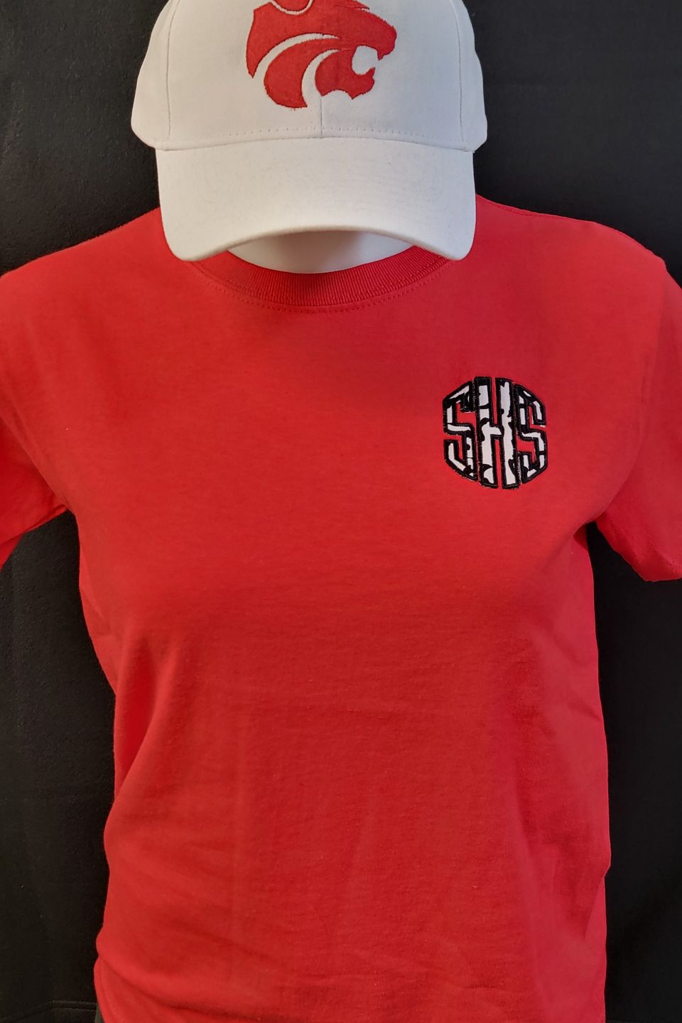 Example of Direct to Film (DTF) transfer - SHS logo on a white t-shirt, & embroidered logo cap,