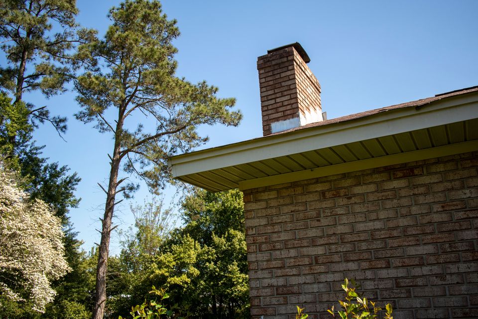 chimney on roof of suburban home