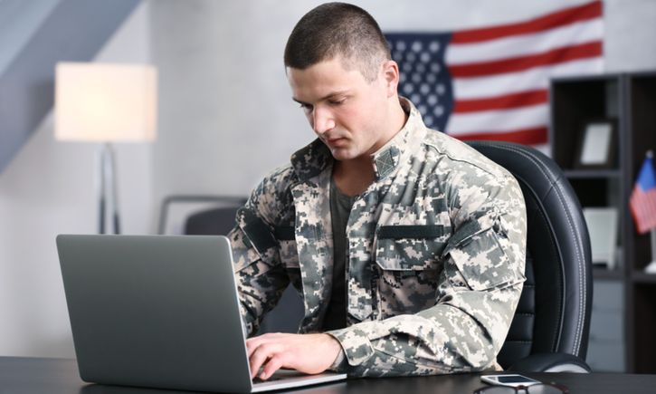 Military man on computer