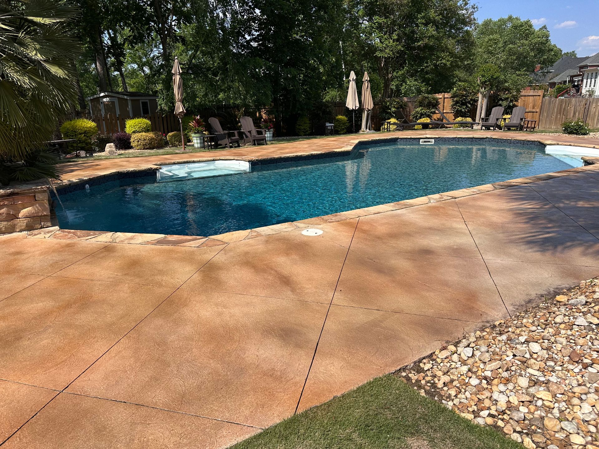 After photo of Evans GA pool deck with warm decorative concrete finish