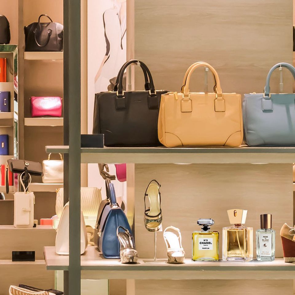 Inside a fragrance boutique with designer perfume displays