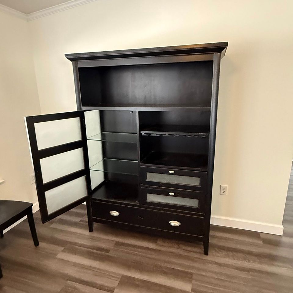 A black cabinet after being transported by JNJ Hauling Solutions of Citrus County