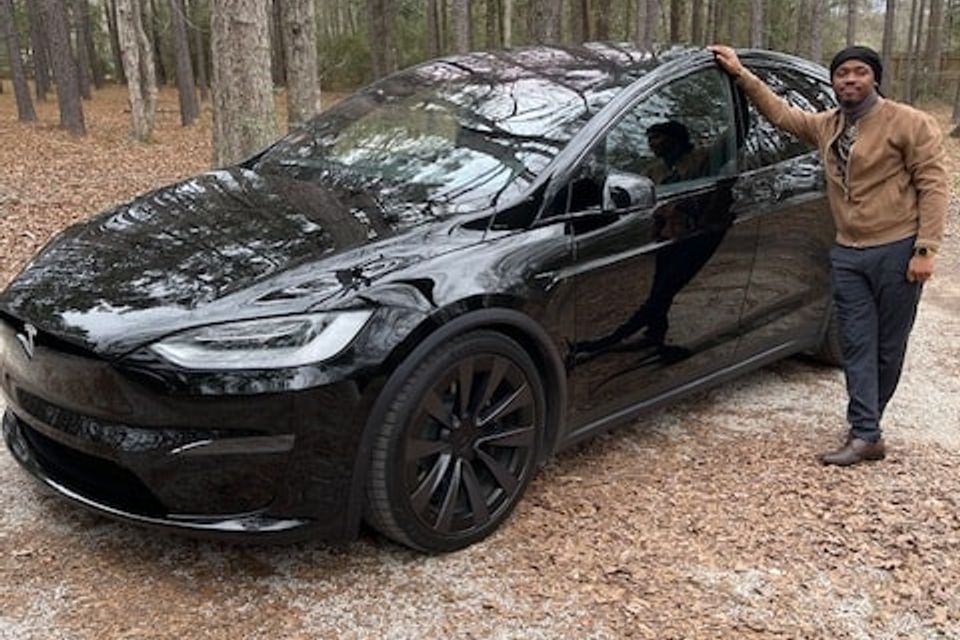 Abner shotwell with black tesla min