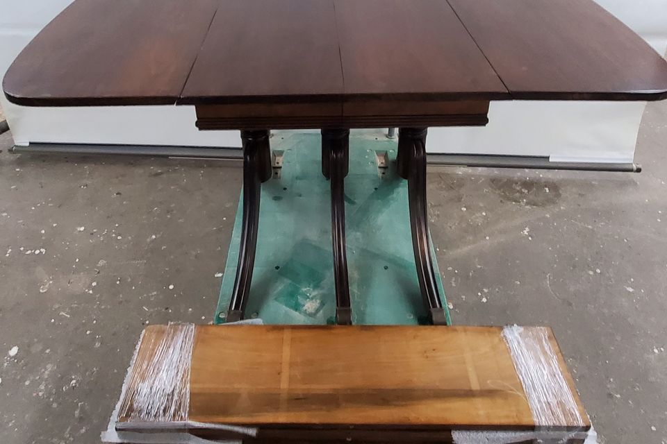 Antique restoration of this duncan phfye dining  room table