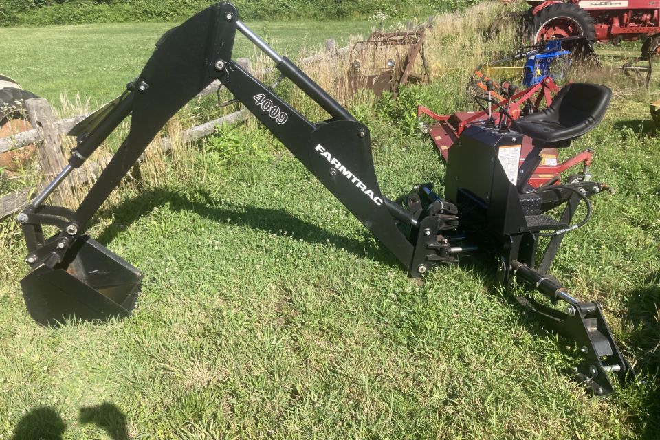 Farmtrac backhoe left