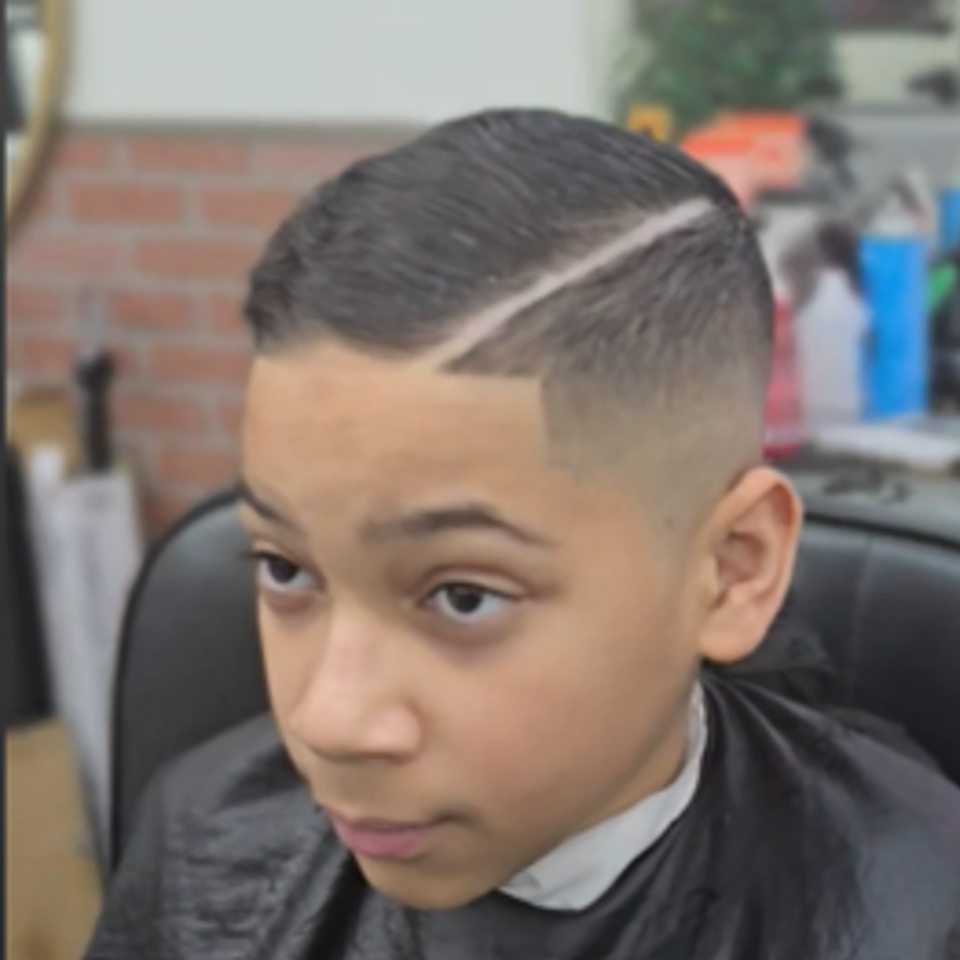 New young client with fade haircut at Bronx NY barbershop Jeff Barber Services