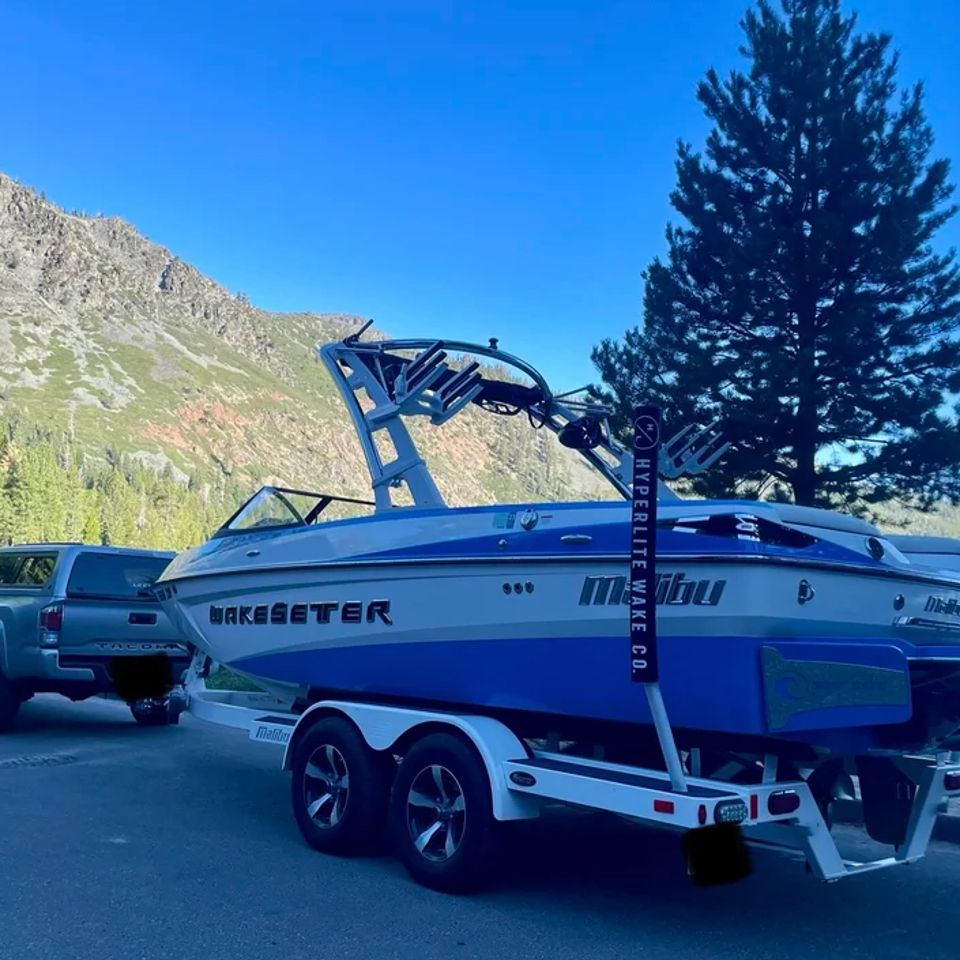 KPCopy's truck hooked up to their Malibu Wakesetter at Fallen Leaf Lake 