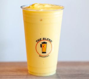 Tango Mango smoothie made with mango juice, mango, pineapple, and frozen yogurt.