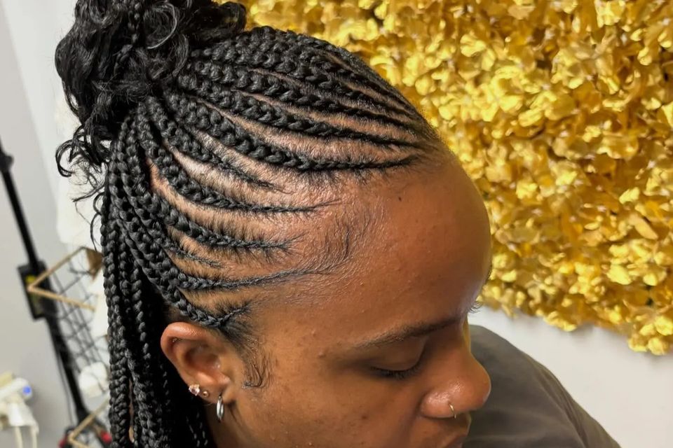 Feed in cornrows into a curly braided ponytail after a braiding service in Los Angeles CA